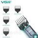 Компактна машинка для стрижки VGR V-671 з LED-дисплеєм та 4 насадками.